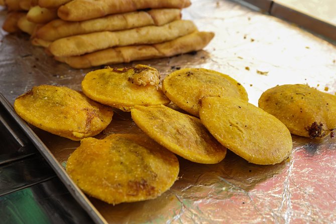 Street Food Tour with a local Foodie in Cartagena - Portal de los Dulces, coconut candy, jams, and sweet souvenirs