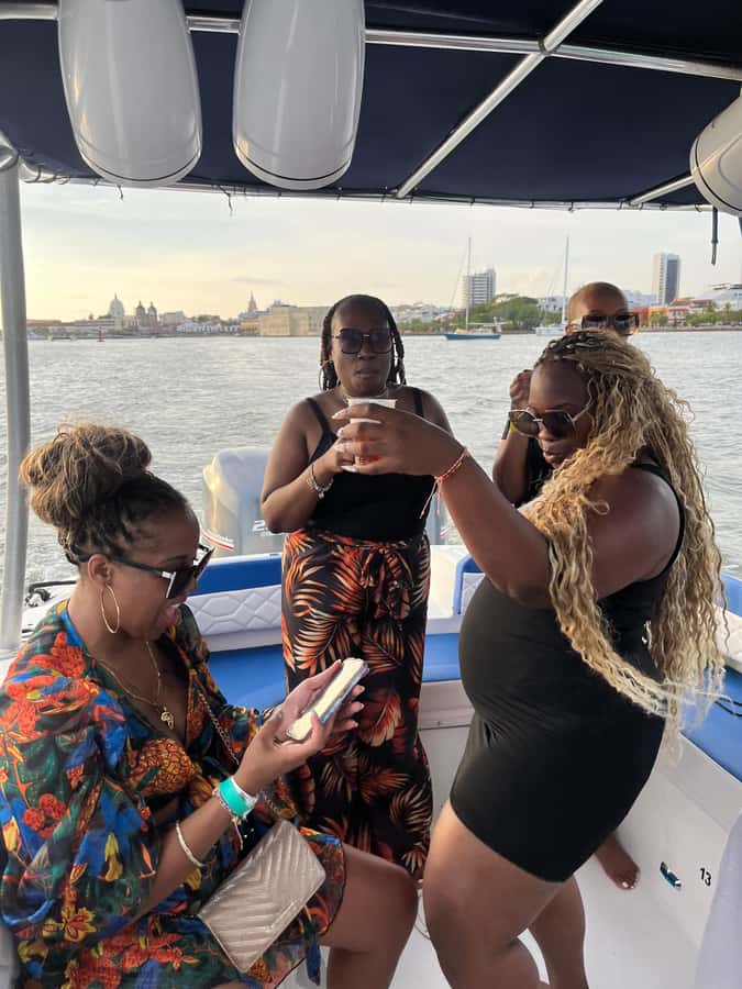 Sunset Party open bar on the bay while sharing with locals - Should you book this Cartagena sunset party?