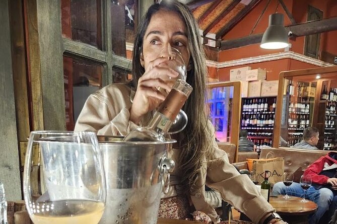 Villa de Leyva Food Tour at Sunset - Stop 3 at Los vinos: Wine, Artisan Pizza, and Live Music on a Terrace-Balcony