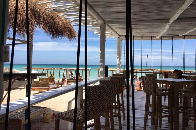 white beach from Cartagena - Playa Blanca Setup: Beds, Chairs, Lunch, and Coffee